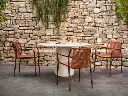 Vincent-Sheppard_Mistral-dining-table_Sweep-dining-chair-cinnamon-rust_HR.webp