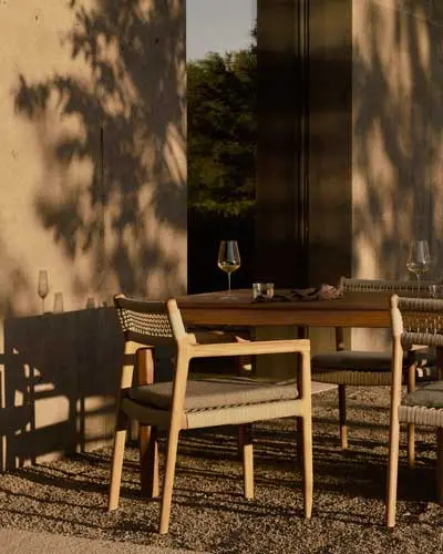 10304_Bok_outdoor_dining_table_teak_10340_Jack_Woven_outdoor_dining_chair_teak_Beige_cord_Silt_fabric_2_web.webp